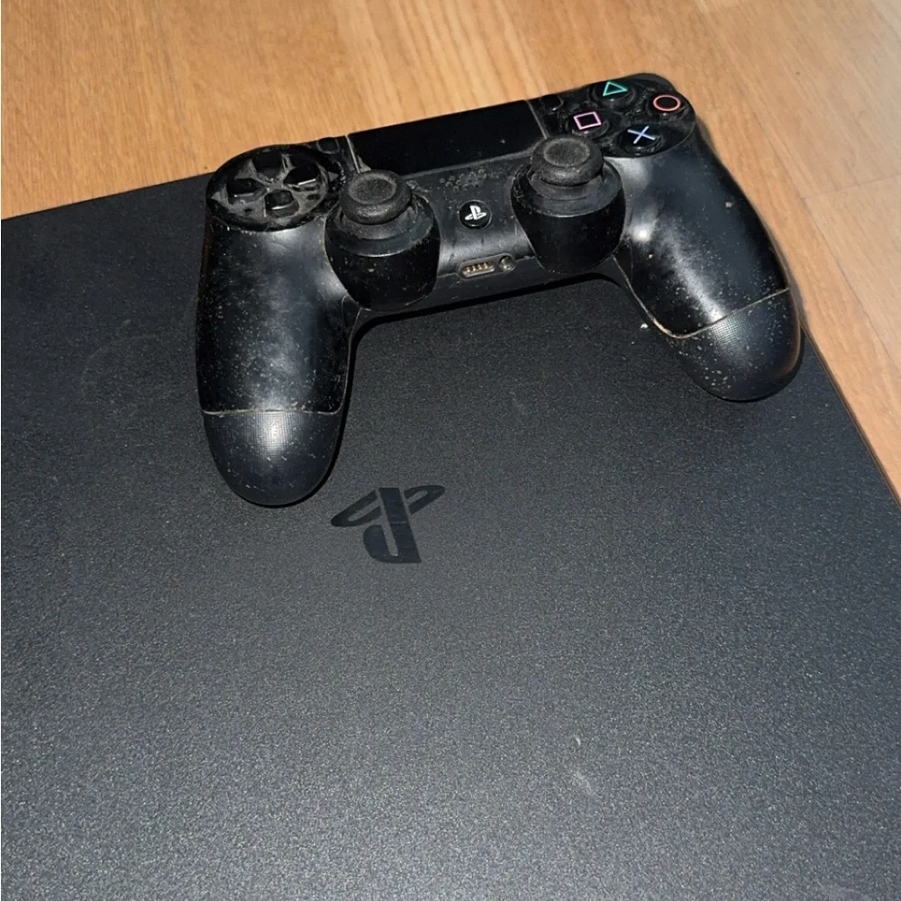 Sony Gaming Console with Black Controller